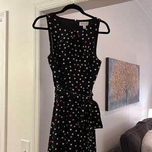 Elle polka dotted dress, size 10, black with colored polka dots.
